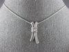 .30CT DIAMOND 14KT WHITE GOLD ROUND & PRINCESS INVISIBLE X LOVE FLOATING PENDANT