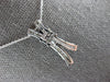 .30CT DIAMOND 14KT WHITE GOLD ROUND & PRINCESS INVISIBLE X LOVE FLOATING PENDANT