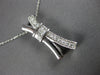 .30CT DIAMOND 14KT WHITE GOLD ROUND & PRINCESS INVISIBLE X LOVE FLOATING PENDANT