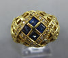 .79CT DIAMOND & AAA SAPPHIRE 18KT YELLOW GOLD ROUND & PRINCESS CRISS CROSS RING