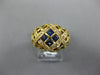 .79CT DIAMOND & AAA SAPPHIRE 18KT YELLOW GOLD ROUND & PRINCESS CRISS CROSS RING