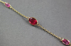 2.03CT LIGHT PINK RUBY 14K YELLOW GOLD OVAL & TRILLION BY THE YARD LOVE BRACELET