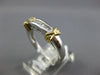 ESTATE .28CT DIAMOND 14KT TWO TONE GOLD 3D BAGUETTE CHANNEL DOUBLE X LOVE RING