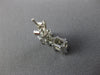 .92CT DIAMOND 18KT WHITE GOLD 3D KITE CUT & BAGUETTE INVISIBLE HANGING EARRINGS