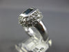 1.66CT DIAMOND & AAA SAPPHIRE 14KT WHITE GOLD EMERALD CUT & ROUND BEZEL FUN RING