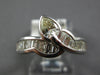 ESTATE 1.47CT WHITE & FANCY YELLOW DIAMOND 18KT WHITE GOLD CRISS CROSS LEAF RING