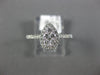 ESTATE .39CT DIAMOND 18KT WHITE GOLD 3D CLUSTER PEAR SHAPE HALO FRIENDSHIP RING