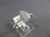ESTATE .39CT DIAMOND 18KT WHITE GOLD 3D CLUSTER PEAR SHAPE HALO FRIENDSHIP RING