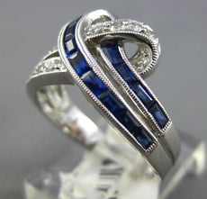 1.49CT DIAMOND & AAA SAPPHIRE 14KT WHITE GOLD 3D ROUND & BAGUETTE LOVE KNOT RING