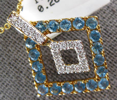 2.17CT DIAMOND & AAA BLUE TOPAZ 18KT YELLOW GOLD SIDEWAYS FUN FLOATING PENDANT