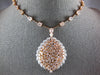 EXTRA LARGE 29.04CT WHITE & PINK DIAMOND 18KT WHITE & ROSE GOLD TENNIS NECKLACE