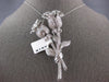 MASSIVE 10.52CT DIAMOND 18KT WHITE GOLD ROUND & BAGUETTE FLOWER ROSE BROOCH PIN