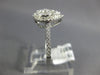 ESTATE .56CT DIAMOND 18KT WHITE GOLD 3D PEAR SHAPE CLUSTER HALO FRIENDSHIP RING