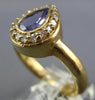 1.12CT DIAMOND & AAA TANZANITE 14KT YELLOW GOLD PEAR SHAPE HALO ENGAGEMENT RING