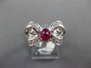 ESTATE .87CT DIAMOND & AAA RUBY PLATINUM 3D OVAL CLASSIC FUN BOW RING
