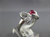ESTATE .87CT DIAMOND & AAA RUBY PLATINUM 3D OVAL CLASSIC FUN BOW RING