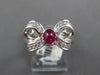 ESTATE .87CT DIAMOND & AAA RUBY PLATINUM 3D OVAL CLASSIC FUN BOW RING