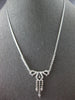 ESTATE 0.92CT DIAMOND 18KT WHITE GOLD FILIGREE MILGRAIN BOW CHANDELIER NECKLACE