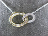 .54CT DIAMOND 14KT 2 TONE GOLD 3D ROUND & BAGUETTE DOUBLE OVAL LOVE KNOT PENDANT