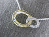 .54CT DIAMOND 14KT 2 TONE GOLD 3D ROUND & BAGUETTE DOUBLE OVAL LOVE KNOT PENDANT