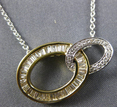 .54CT DIAMOND 14KT 2 TONE GOLD 3D ROUND & BAGUETTE DOUBLE OVAL LOVE KNOT PENDANT