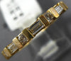 ESTATE .58CT DIAMOND 14KT YELLOW GOLD ROUND & BAGUETTE CHANNEL ANNIVERSARY RING