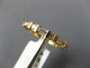 ESTATE .58CT DIAMOND 14KT YELLOW GOLD ROUND & BAGUETTE CHANNEL ANNIVERSARY RING