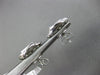 LARGE .59CT DIAMOND 14KT WHITE GOLD 3D PRINCESS INVISIBLE FLOWER STUD EARRINGS