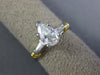 .93CT DIAMOND PLATINUM & 18K GOLD 3D PEAR SHAPE & BAGUETTE ENGAGEMENT RING #1894