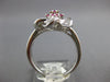 1.08CT DIAMOND & AAA PINK SAPPHIRE 18KT WHITE GOLD ROUND & BAGUETTE FLOWER RING