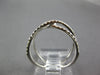 ESTATE WIDE .43CT DIAMOND 18KT WHITE & ROSE GOLD CRISS CROSS INFINITY LOVE RING