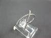 ESTATE WIDE .43CT DIAMOND 18KT WHITE & ROSE GOLD CRISS CROSS INFINITY LOVE RING