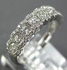 WIDE .86CT DIAMOND 18KT WHITE GOLD 3D ROUND HALO SEMI ETERNITY ANNIVERSARY RING