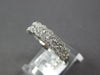 WIDE .86CT DIAMOND 18KT WHITE GOLD 3D ROUND HALO SEMI ETERNITY ANNIVERSARY RING