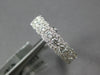 WIDE .86CT DIAMOND 18KT WHITE GOLD 3D ROUND HALO SEMI ETERNITY ANNIVERSARY RING