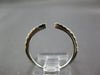 ESTATE .29CT DIAMOND 18KT WHITE GOLD 3D CLASSIC OPEN TENSION 2MM FUN RING