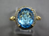 2.57CT DIAMOND & AAA BLUE TOPAZ 14KT YELLOW GOLD 3D OVAL HALO CLASSIC FUN RING