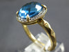 2.57CT DIAMOND & AAA BLUE TOPAZ 14KT YELLOW GOLD 3D OVAL HALO CLASSIC FUN RING
