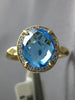 2.57CT DIAMOND & AAA BLUE TOPAZ 14KT YELLOW GOLD 3D OVAL HALO CLASSIC FUN RING