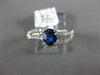 .97CT DIAMOND & AAA SAPPHIRE 18KT WHITE GOLD OVAL & ROUND SWIRL ENGAGEMENT RING