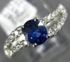 .97CT DIAMOND & AAA SAPPHIRE 18KT WHITE GOLD OVAL & ROUND SWIRL ENGAGEMENT RING