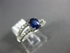 .97CT DIAMOND & AAA SAPPHIRE 18KT WHITE GOLD OVAL & ROUND SWIRL ENGAGEMENT RING