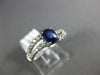 .97CT DIAMOND & AAA SAPPHIRE 18KT WHITE GOLD OVAL & ROUND SWIRL ENGAGEMENT RING