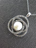 .50CT DIAMOND & AAA SOUTH SEA PEARL 14KT WHITE GOLD LOVE KNOT INFINITY PENDANT