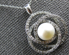 .50CT DIAMOND & AAA SOUTH SEA PEARL 14KT WHITE GOLD LOVE KNOT INFINITY PENDANT
