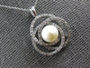 .50CT DIAMOND & AAA SOUTH SEA PEARL 14KT WHITE GOLD LOVE KNOT INFINITY PENDANT