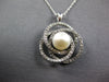 .50CT DIAMOND & AAA SOUTH SEA PEARL 14KT WHITE GOLD LOVE KNOT INFINITY PENDANT