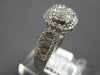 1.40CT DIAMOND 18KT WHITE GOLD 3D ROUND & BAGUETTE INVISIBLE OCTAGON FLOWER RING