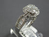1.40CT DIAMOND 18KT WHITE GOLD 3D ROUND & BAGUETTE INVISIBLE OCTAGON FLOWER RING