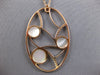 ESTATE LARGE .33CT DIAMOND & AAA MOTHER OF PEARL 14KT ROSE GOLD OVAL FUN PENDANT